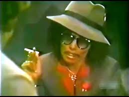 Joni Mitchell in Blackface and Drag