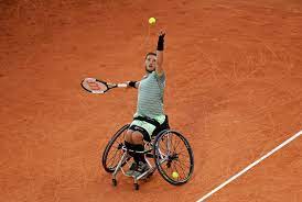 A player leaving the court in a wheelchair. Top Seeds Advance As French Open Wheelchair Singles Contests Begin