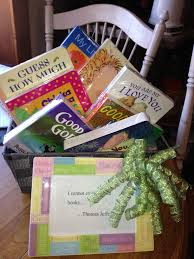 You might not know this, but the baby showers we know are a relatively new invention. Baby Shower Book Basket One If My Favorite Gifts To Give Wrap Books In Cellophan Woodland Creatures Baby Shower Favorite Things Gift Baby Shower Inspiration