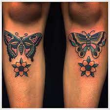 Traditional Color Butterfly And Flower Leg Tattoo Tattoosbyloaf Flower Leg Tattoos Leg Tattoos Tattoos