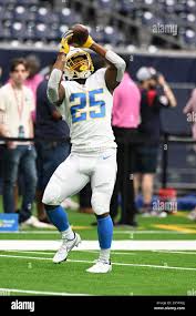 Los Angeles Chargers running back Larry Roundtree III (34) participates in  drills during a combined NFL practice with the Dallas Cowboys at the Los  Angeles Rams' practice facility in Costa Mesa, Calif.