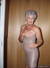 Porn image of strip club seductive nude lift dress wife 90 standing created  by AI