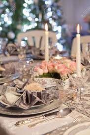 Jamón is the staple of the spanish table, says chef josé pizarro,. Christmas Tree And Fancy Dinner Table With Folded Napkins Stock Photo Picture And Royalty Free Image Image 11139985