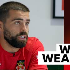 Wrexham midfielder Elliot Lee (39900413-Andy Cannon celebrates putting  Wrexham 1-0 up at Picture by GEMMA THOMAS 458507808-newport thurs phil lead  30-11 andy cannon )