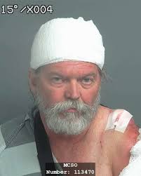 Banged-up biker charged for motorcycle crash