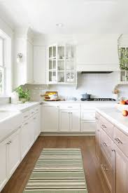 White subway tile can be used as material for kitchen backsplash in traditional kitchens tags: Our Favorite Kitchen Backsplash Tiles Bria Hammel Interiors