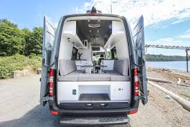 The tread plate step and ladder lead the way to his touring roof rack. Sprinter Van Conversion The Ultimate Guide To A Sprinter For Van Life