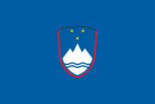 The national flag of slovenia features three equal horizontal bands of white (top), blue, and red, with the coat of arms of slovenia located in the upper hoist side of the flag centered in the white and blue bands. Flag Of Slovenia Wikipedia Republished Wiki 2