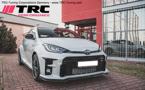 The new toyota gr yaris * in karmina rot metallic and the toyota gr supra dynamic * in celebrity red incl. Trc Tuning Corporations Germany E K Toyota Lexus Mazda Tesla Tuning Developments Trc Performance Frontspoileransatz Cup Lippe Toyota Yaris Gr V 1 Carbon Look