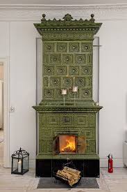 Scandinavian wood burning contura stoves at their very best. Apartment In Sweden Inspiring Interiors Modern Fireplace Swedish Interiors Fireplace