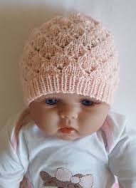 This 4ply Baby Beanie Has A 1x1 Rib Band Is Worked In A Lovely Lace Stitch Then Has A Stocking Baby Hats Knitting Baby Hat Knitting Pattern Baby Hat Patterns