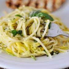Strands Of Zucchini And Yellow Squash Mingled With Pasta In A Light Lemon And Basil Sauce Recipes Pasta Dishes Food
