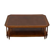 Walnut coffee table made by heritage henredon with four tapering wood stretchers that each have a curved metal detail in the center. 83 Off Henredon Furniture Henredon Acquisitions Coffee Table Tables