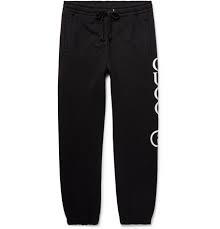 Gucci Tapered Logo Print Loopback Cotton Jersey Sweatpants Men Black The Fashionisto Gucci's jacquard stripe runs along the length of the leg, with the text logo nestled between. gucci tapered logo print loopback cotton jersey sweatpants men black