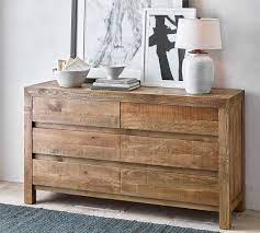 Crafted from reclaimed pine wood, mdf on back panel and veneers. Hensley Reclaimed Wood 6 Drawer Wide Dresser Pottery Barn