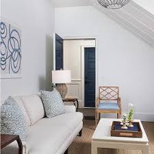 Decorate a very slanted wall in the living room. Living Room Sloped Ceiling Design Ideas