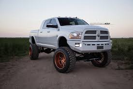 Don't think a set of gold truck rims will soften up your rig—these. Lifted Ram 2500 On Rose Gold Wheels Meets A Horse Autoevolution