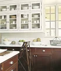 I Want The Ladder But I Do Love The Mix Of White Wall Cabinets With Wood Base Cabinets Brown Kitchen Cabinets Kitchen Cabinets Wood Kitchen Cabinets