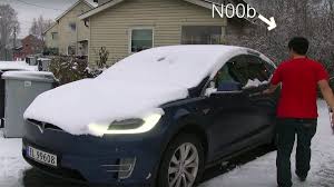 Windows was still frozen but the retraction action broke the ice. How Does A Tesla Model X Handle Winter Frost