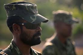 Maldivian Marine Corps Cpl. Mohamed Fazeel observes