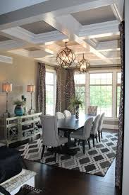 Available in a range of colours, let them stir up the light above. Two Globe Chandeliers Hang Above The Dining Room Table Design And Furnishing By Design S Dining Room Interiors Rustic Dining Room Lighting Rustic Dining Room