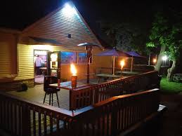 Jj S Side Out Bar Grill Kome beach house is integrated to the village where we belong, if you are looking for beach reserved for you and animation screen this is definitely not for you. jj s side out bar grill