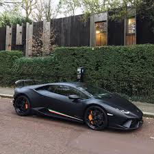 Lamborghini Huracan Performante Black And Blue Lamborghini Huracan Performante Painted In Nero Nemesis W Tricolore Stripes Along The Doors Phot Lamborghini Cars Sports Cars Lamborghini Lamborghini Huracan