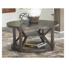 Made of veneers, wood and engineered wood. T234 8 Ashley Furniture Jessoli Living Room Round Cocktail Table