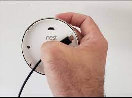 Remove the old batteries from the back of the thermostat display. Nest Thermostat Battery Onehoursmarthome Com
