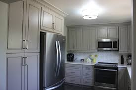 Light is essential to human presence, always and almost everywhere. Peterborough Family And Their Painted Grey Kitchen Cabinets With Cool White Quartz Countertop Kitchen Cabinets And Granite Countertops I Rockwood Kitchens