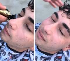 Men are reportedly trimming their eyelashes in order to look “less  feminine”.