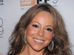 Carey drops the diva act