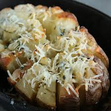 Blooming Baked Potato Recipe By Tasty Recipe Potato Recipes Recipes Healthy Potato Recipes
