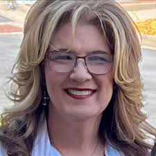 Is it possible to focus this photo of my dad back in the 70's please??