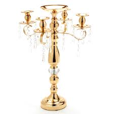 Light up you home and dining area. Candelabra 4 Arm Pillar Candle Holder Gold
