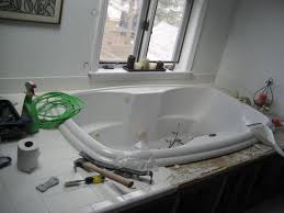 Whirlpool tub maintenance to effectively clean a whirlpool, you'll want to fill the tub with hot water to a few inches above the jets and run them for about 15 minutes. How Do I Lift My Jacuzzi To Retile The Box Ceramic Tile Advice Forums John Bridge Ceramic Tile