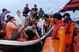 Rescue personnel set up an area to hold debris and remains from the missing sriwijaya air flight sj 182, on jan. Ix23dyzq X1k5m