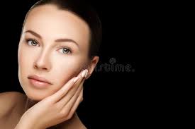 Happy Serene Young Woman with Beautiful Olive Skin and Curly Hair Ideal  Skin and Brown Eyes in Studio Stock Image