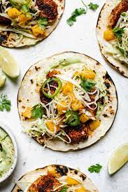 Not only is the fish grilled, but nearly everything in the tacos is, including the grilled cherry salsa! Grilled Cod Fish Tacos Mango Ginger Slaw Avocado Crema Pwwb
