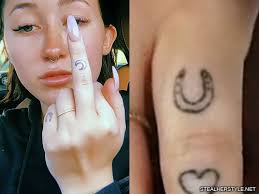 World famous tattoo & smoke shop in the ft. 8 Celebrity Horseshoe Tattoos Steal Her Style