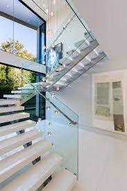 A Contemporary Home In Bel Air By Paul Mcclean 8 Homedsgn Luxury Staircase Home Stairs Design Modern Staircase