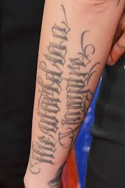 Amber Rose Tattoos And Meanings Rose Tattoo On Arm Amber Rose Tattoo Tattoos