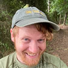 Ben made a friend! This very relaxed green tree frog was lounging