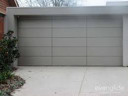 Tilt Garage Door Consisting Of Composite Aluminium Cladding Garage Door Design Garage Doors Custom Garage Doors