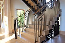 The open frames are customizable to meet design and safety requirements for both residential and commercial spaces. Modern Industrial Stairs Compass Iron Works