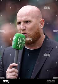 Former Celtic player John Hartson working for Celtic TV during the cinch  Premiership match at Celtic Park, Glasgow. Picture date: Saturday August 5,  2023 Stock Photo