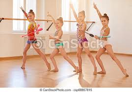 This also includes using the body as a form of expression. Little Gymnasts Training Team Of Little Girls Practicing Rhythmic Gymnastics With Clubs Canstock