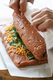 The Best Tasting Moist Turkey Meatloaf Stuffed With Cheddar Cheese Spinach And Rolled Jelly Ro Turkey Meatloaf Recipes Moist Turkey Meatloaf Turkey Meatloaf