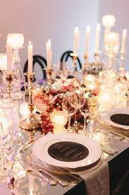 Decorations for a party can be as simple as candlesticks on the table, or more elaborate streamers, balloons, flower arrangements, tablecloths. Luxurious Dinner Set Up Luxurious Glassware Clear Candles Stunning Set Up Amazing Art De La Dinner Party Candles Dinner Table Decor Elegant Table Settings