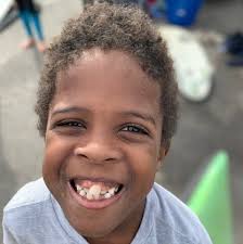 Grif the Great: Remembering how 1 boy's example of love and light brought  joy to an island community